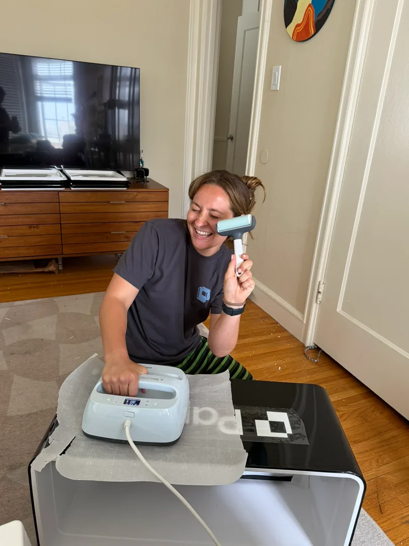 Prepping the Paper cooler logo with a roller